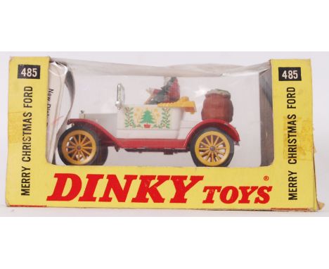 An original vintage diecast 485 Dinky Christmas Model T with novelty Father Christmas. Within original box.&nbsp;

POSTAGE: W