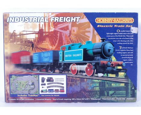 An original electric Industrial Freight train set by Hornby with trakmat R1005. Oval track requirement 109cm by 94cm. Appears