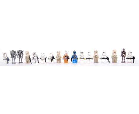 A collection of Lego Star Wars minifigures to include; a chrome coloured Stormtrooper, Sand Troopers, Droids, Stormtroppers e
