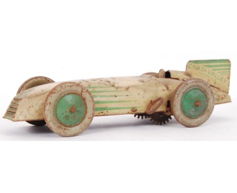 An original vintage 1940's Chad Valley Harborne cream &amp; green clockwork car with original key. Unboxed.&nbsp;

POSTAGE: W