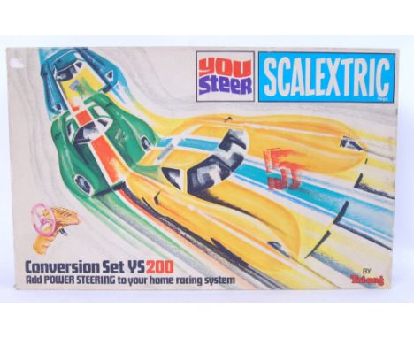 An original vintage Tri-ang You Steer Scalextric set YS200. Appears complete and within original box.&nbsp;

POSTAGE: Worldwi