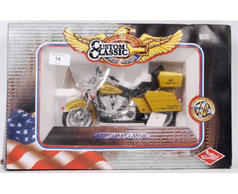 An original Guiloy diecast Custom Classic gold motorbike. Within original box.

POSTAGE: Worldwide Postage &amp; Packing Avai
