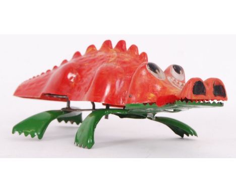 An original vintage clockwork 1950's Triang Minic tinplate Jabberwock. No key. Unboxed.&nbsp;

POSTAGE: Worldwide Postage &am