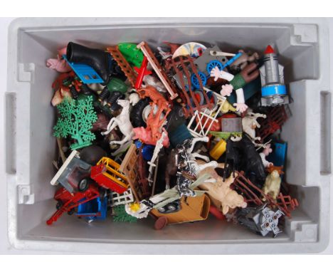 A large collection of plastic farm yard animals by Britains and others to include; pigs, horses, Lesney tractor, trailer etc,