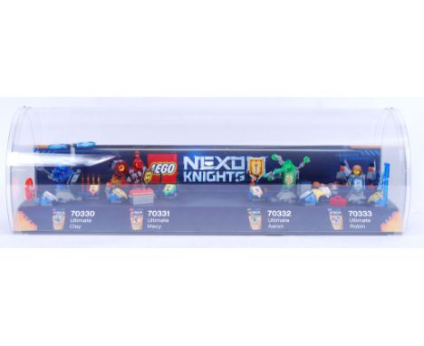 An original Shop Display Lego Nexo Knights shelf cabinet - featuring 4x Nexo Knights sets; 70330, 70331, 70332 and 70333. 56c