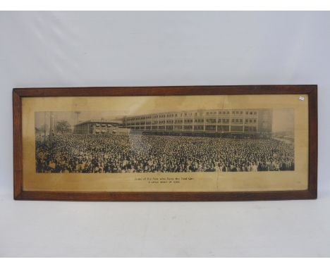 An oak framed and glazed black and white image titled 'Some of the Men Who Make the Ford Car' - 'a little group of 12,000', 4
