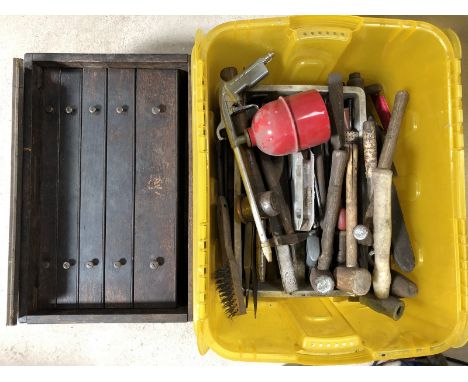 A wooden tool chest containing engineering tools plus a large box of tools. 