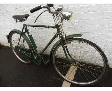 A Raleigh gent's bicycle with Brooks saddle, headlamp etc. 