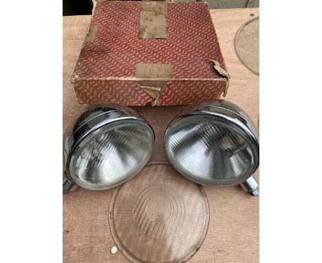 Four headlamp glasses to suit P100s, plus two others and a pair of headlamps.