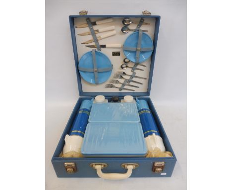 A Sirram plastic picnic set. 