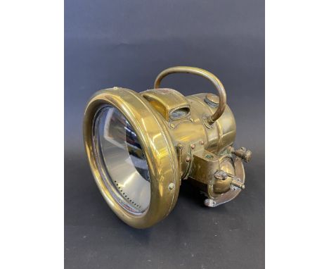 A good Lucas No. T.54 'Landalite' polished brass acetylene self generating lamp, in good condition. 