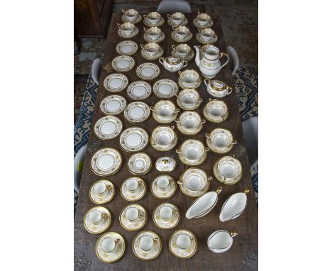 PART TEA SERVICE, Aynsley 'Imperial Gold' including eleven tea cups and sauces, nine coffee cups and sauces, ten soup bowls, 