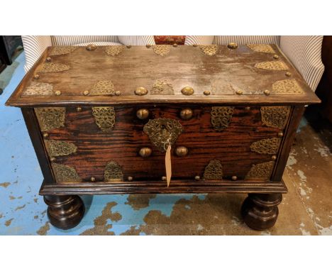 TRUNK, 63cm H x 94cm W x 44cm D, late 17th/early 18th century Dutch East Indies, teak and brass mounted, on separate turned s