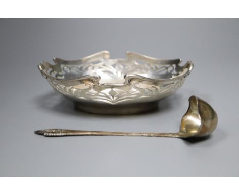 An early 1930's Georg Jensen silver cream ladle, 14.5cm and an Art Nouveau pierced silver dish, Birmingham, 1904, 15.4cm, gro