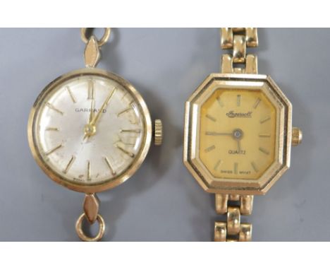Two 9ct gold-cased ladys' wristwatches (Garrard manual and Ingersoll quartz) on 9ct bracelets (gross 27 grams).CONDITION: Gar