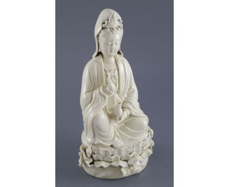 A Chinese Dehua blanc de chine figure of Guanyin, impressed seal to back, 26.5cm highCONDITION: Two very minor chips to lotus