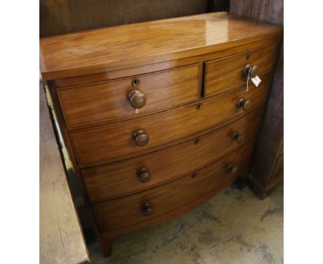 A bow-fronted mahogany chest fitted two short drawers and three long drawers, width 98cm depth 48cm height 103cm