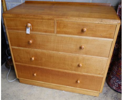 A light oak Heals-style chest of drawers, width 106cm depth 50cm height 96cm