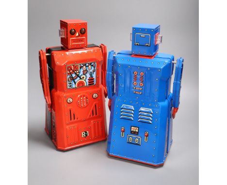 Rocket USA, a rare limited edition 2001 Red R-1 Robot with Black Band, No. 15/34 and a blue version of the R-1 Robot, each bo