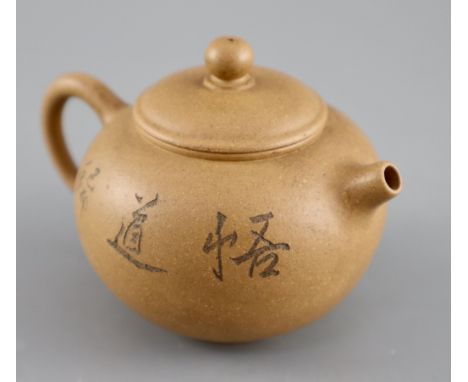 A Chinese Yixing zisha teapot, carved with a scholar, impressed seal of Fan Zhuangnong, 11cm across