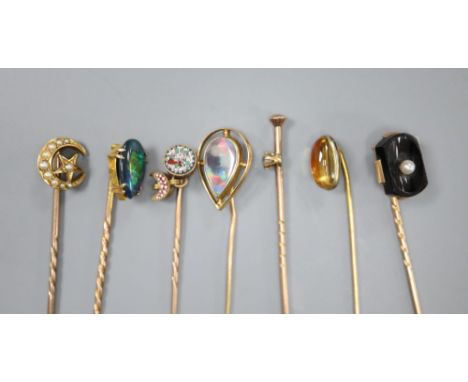 Seven assorted Edwardian gem set stick pins including 18ct and seed pearl, gross 2 grams, 14k and opal, gross 1.5 grams, four