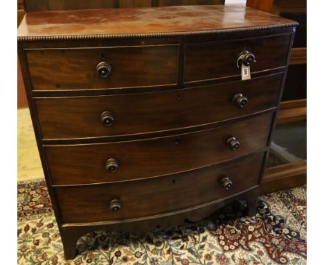 A bow-fronted mahogany chest fitted two two short drawers and three long drawers with beaded edges, width 108cm depth 56cm he