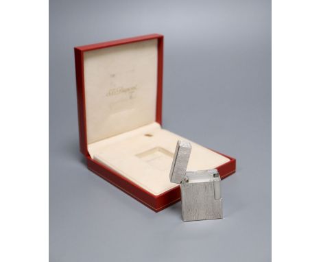 A Dupont silver plated cigarette lighter, in original case with dated receipt '99CONDITION: Good condition.