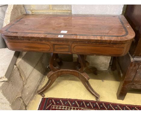 A Regency banded mahogany folding top card table, width 91cmCONDITION: Rather worn and damp damaged, much in need of a good r