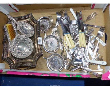 A quantity of plate including cutlery, coasters, brush, comb (a/f.) and mirror set, etc.