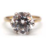 A 9ct CZ ring, the round claw mounted CZ set to a plain band stamped 375, with Sheffield assay mark,