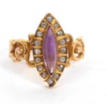 An amethyst and diamond ring, the marquise amethyst cabochon surrounded with small round diamonds,