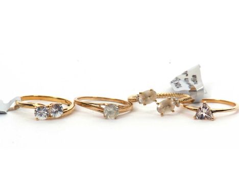 Four gemset rings: to include a 9ct single stone white zircon ring with plain band hallmarked Birmingham 2019, size R, 1.8g, 