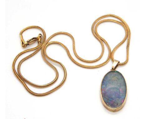 An opal pendant and chain, the oval opal in collet mount with open back, 25mm long, with tapered bale stamped 9ct, on chain w