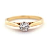 An 18ct solitaire ring, the round brilliant cut diamond, estimated approx. 0.33cts, with plain