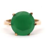A prasiolite ring, the round green prasiolite, approx. 12mm diameter, claw mounted to a plain band