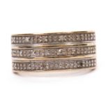 A 9ct diamond ring, the upper half set with three rows of small round diamonds, with tapered