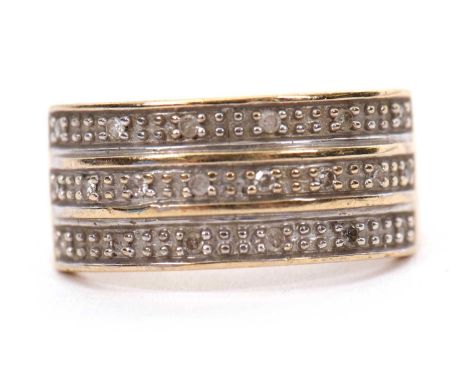 A 9ct diamond ring, the upper half set with three rows of small round diamonds, with tapered shoulders and plain band stamped