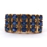 A 9ct stone blue gemset ring, the three rows of round faceted gemstones (possibly kyanite), with