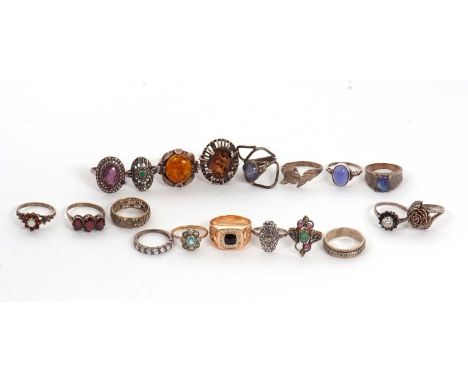 A quantity of gemset rings: to include emerald, ruby, amber, agates, opal etc, set in silver, white and yellow metal, 83g, (1