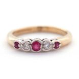 A 9ct ruby and diamond ring, the alternating graduated round rubies and diamonds, collet mounted