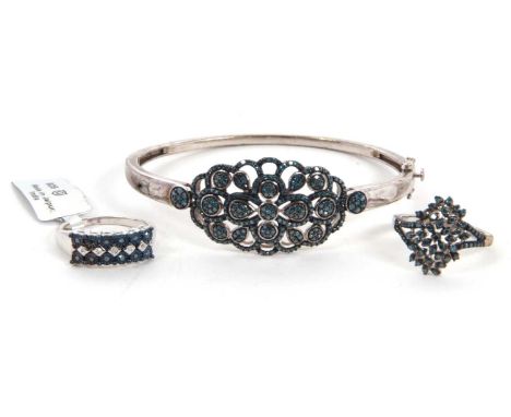 Two treated blue diamond rings and similar bangle: to include a treated blue diamond cluster ring, with split shoulders quart