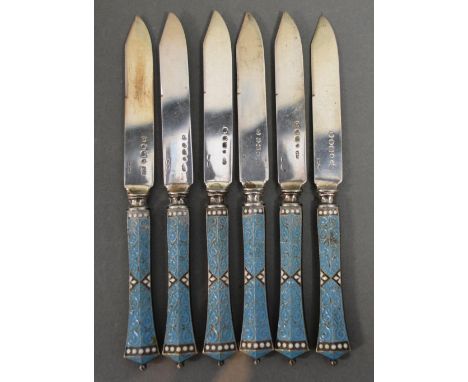 A Set of Six Norwegian Silver and Enamel Tea Knives, the handles decorated in blue and white wire work enamel 