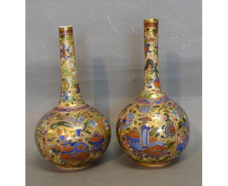 A Pair of 19th Century Chinese Bottleneck Vases decorated in polychrome enamels and highlighted with gilt, seal mark to bases