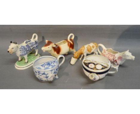 A 19th Century Cow Creamer decorated with Willow Pattern in Underglaze Blue, together with two other cow creamers and another