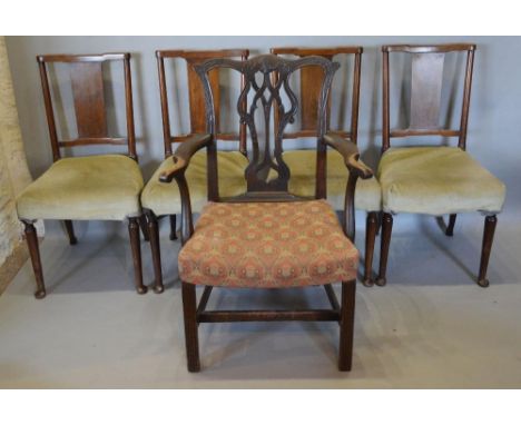 A 19th Century Chippendale Style Armchair, the shell carved splat back above a stuff over seat and with shaped arms, raised u