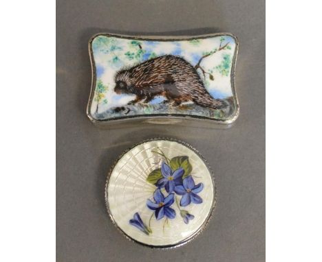 A George V Silver Pin Box, the hinged cover decorated in enamel with a hedgehog, together with another similar Birmingham sil