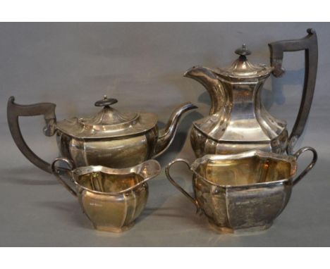 A George V Silver Four Piece Tea Service comprising teapot, hot water pot, sucrier and cream jug, makers mark EV, Sheffield 1