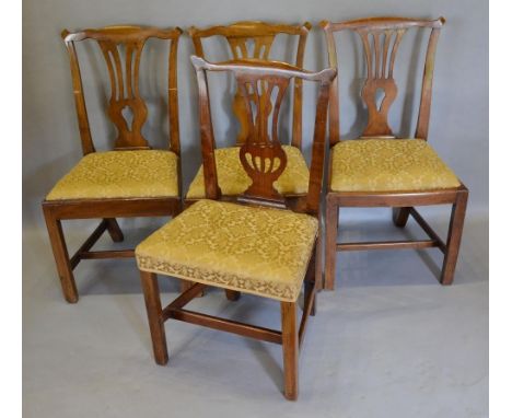 A Harlequin Set of Four 19th Century Chippendale Style Country Chairs, each with a pierced splat back and raised upon square 