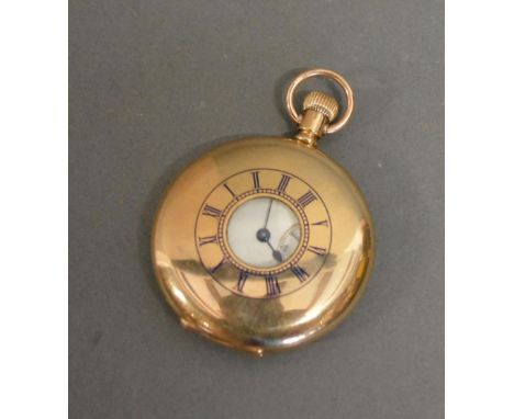 9ct. Gold Half Hunter Pocket Watch, the enamel dial with Roman numerals and subsidiary seconds dial and inscribed Elgin 