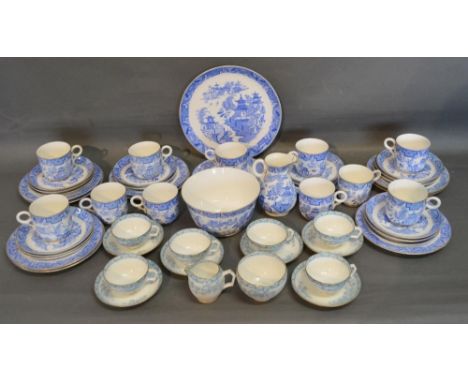 A Royal Worcester Tea Service decorated Willow Pattern, together with another similar Worcester tea service 